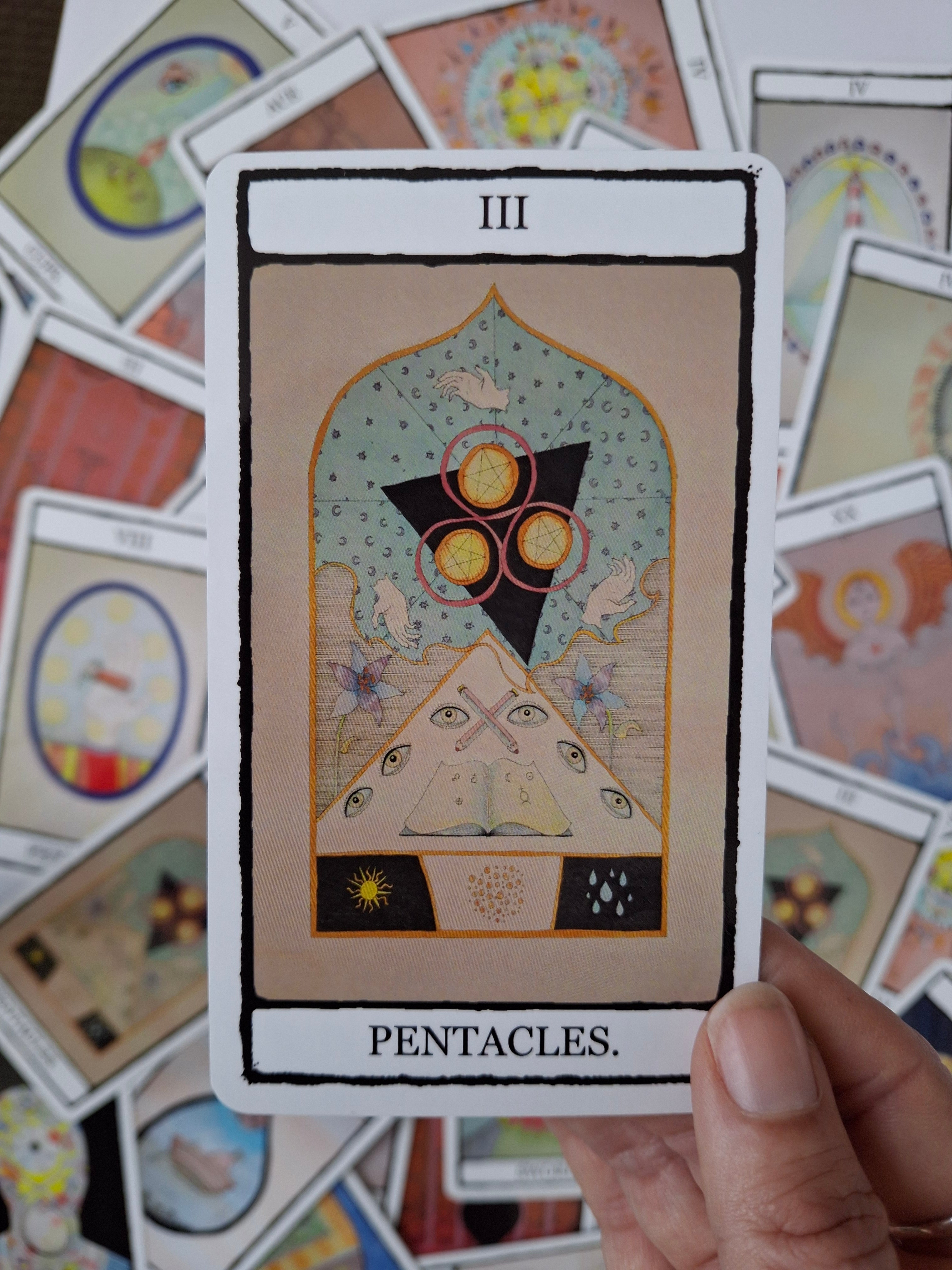Card from a hand illustrated tarot deck, featuring witchy art  and the words 3 Pentacles