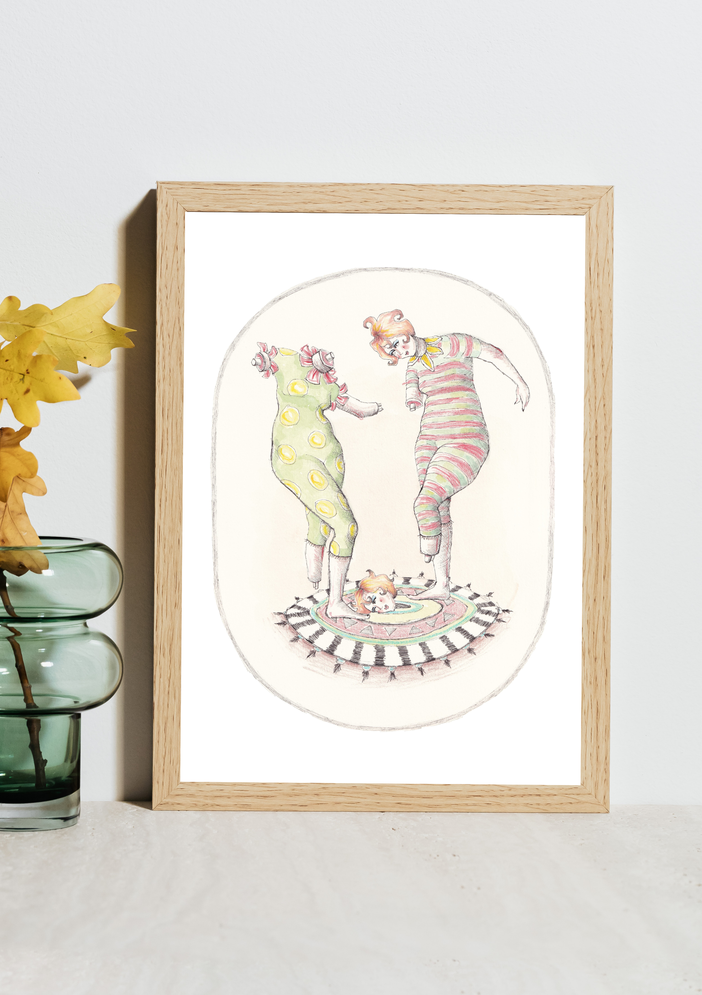 Whimsical dancing figures print in black frame on mustard yellow wall, modern home decor styling