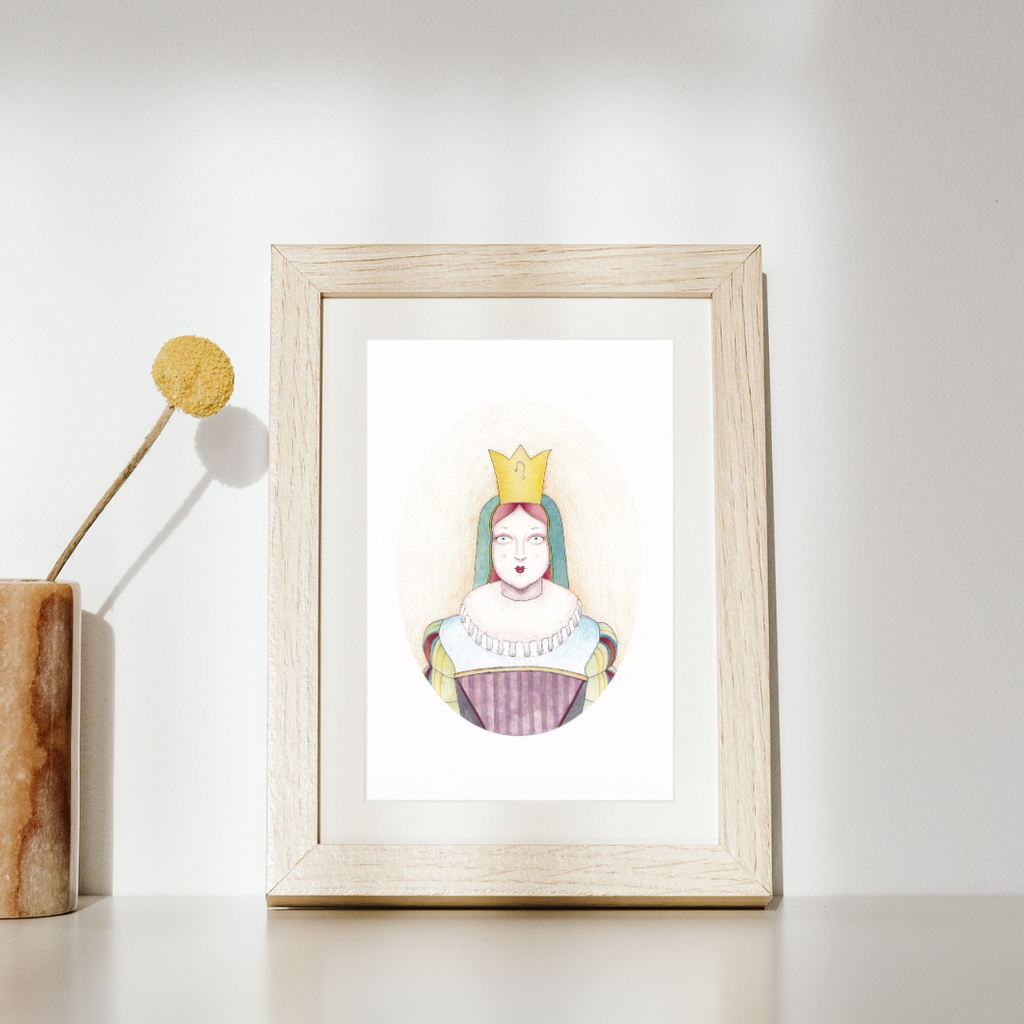 Giclee print of a character with a yellow crown on a white wall
